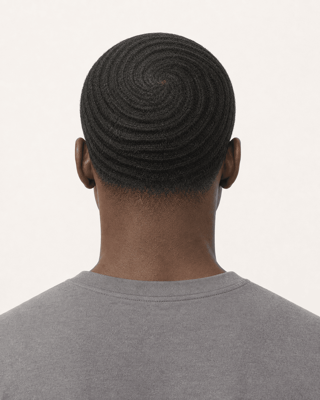 Rear view of 360 waves showing a centered crown whorl and low nape taper