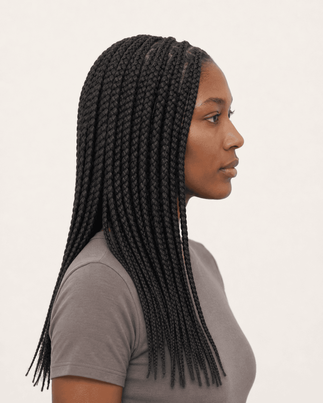 Side profile of center-parted medium knotless box braids