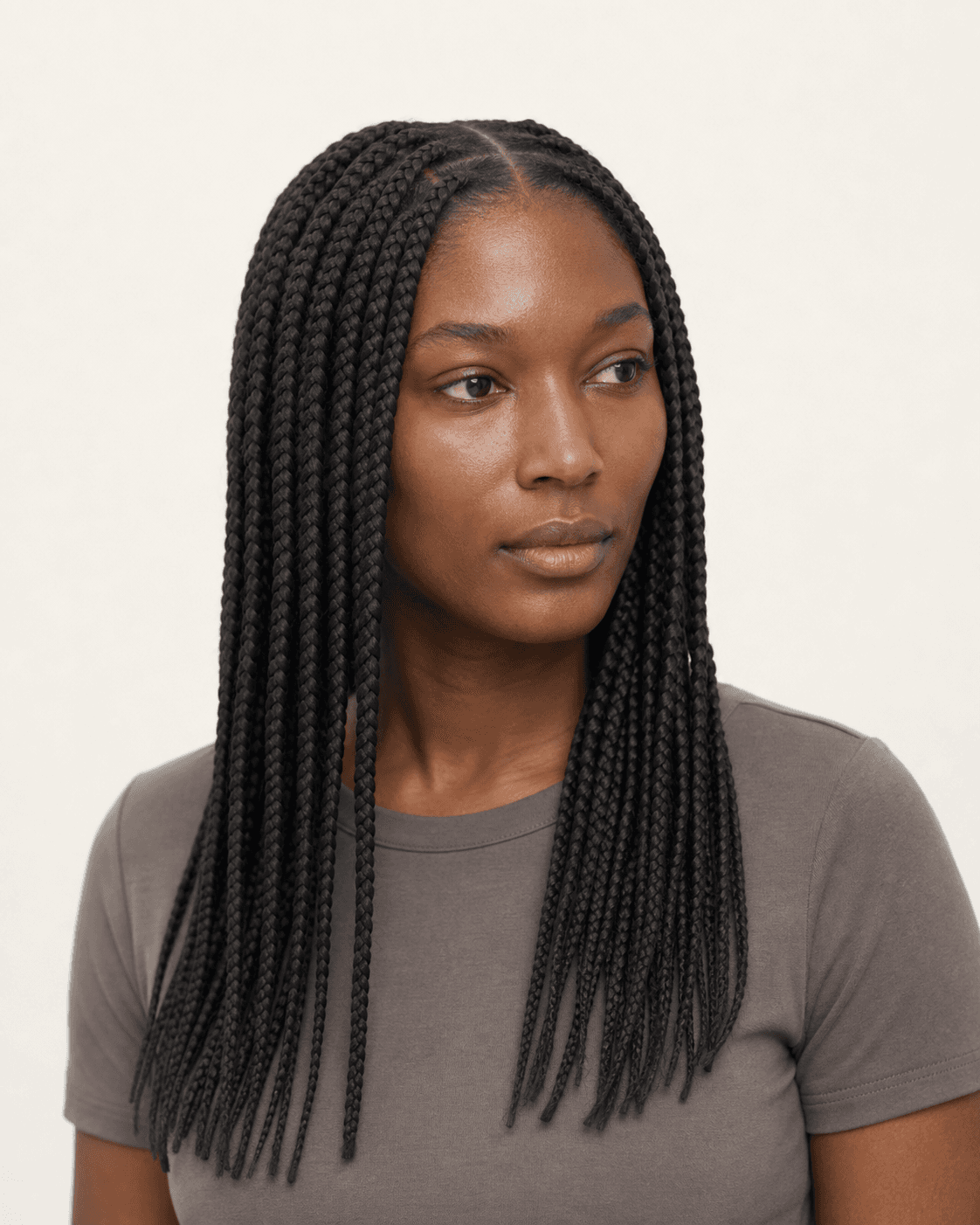 Three-quarter view of medium-width knotless box braids