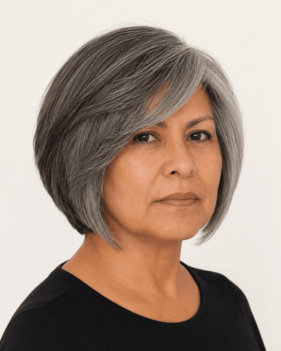 Three-quarter view of a modern layered bob showing soft crown layers and fringe blend